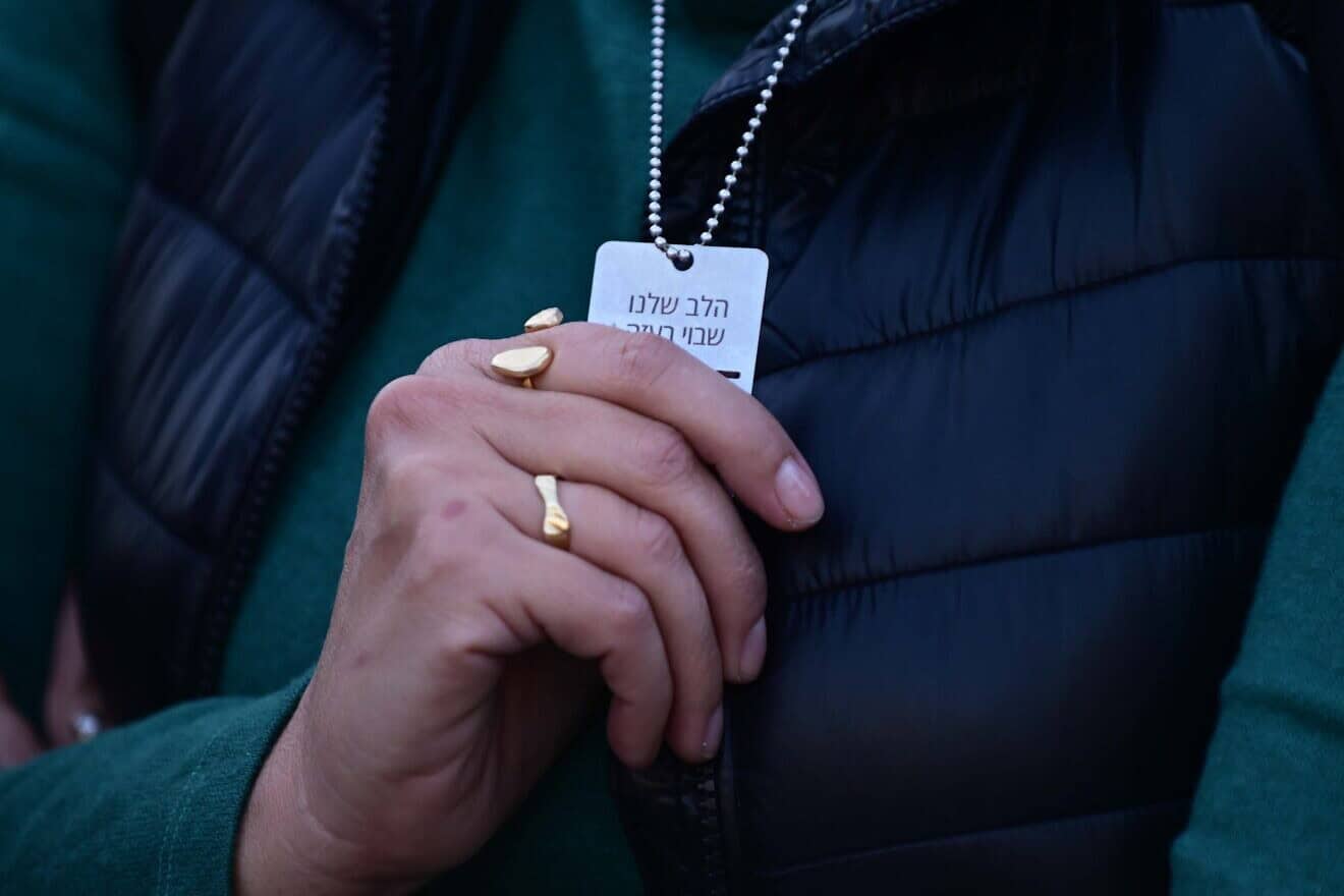 Individuals at "Hostages Square" in Tel Aviv watch the release of three hostages from captivity in Gaza as part of a deal between Israel and Hamas on Jan. 19, 2025. Photo by Tomer Neuberg/Flash90.