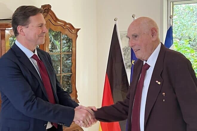 Steffen Seibert, Germany’s ambassador to Israel, presents the Federal Order of Merit to Berlin-born Holocaust survivor George Shefi, 93, in Israel on Jan. 12, 2025. Credit: International March of the Living.