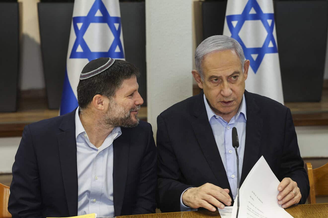 Prime Minister Benjamin Netanyahu and Finance Minister Bezalel Smotrich attend a Cabinet meeting at the Defense Ministry in Tel Aviv on Jan. 7, 2024. Photo by Ronen Zvulun/POOL/AFP via Getty Images.