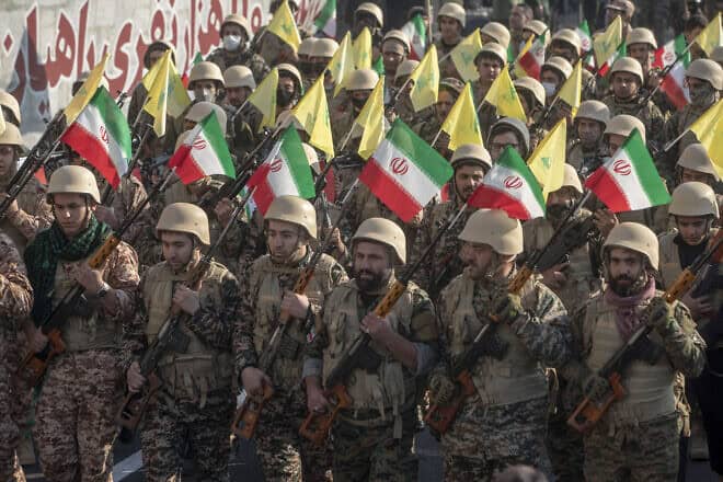 Members of the Iranian Basij paramilitary force march during the force parade during military maneuvers in Tehran on Jan. 10, 2025. Photo by Majid Saeedi/Getty Images.