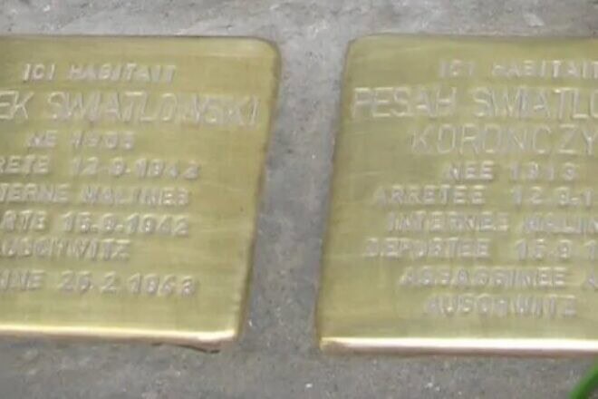 Brass-plated paving stones known as Stolpersteine, placed in front of homes of Holocaust victims and bearing their names. Credit: EJP.
