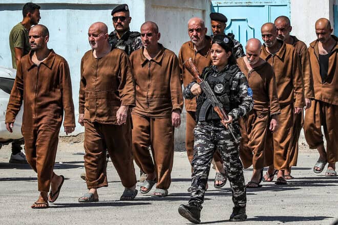 Detainees suspected of being members of the Islamic State group are released in Syria's northeastern city of Hasakeh, on Sept. 2, 2024. Photo by Delil Souleiman/AFP via Getty Images.