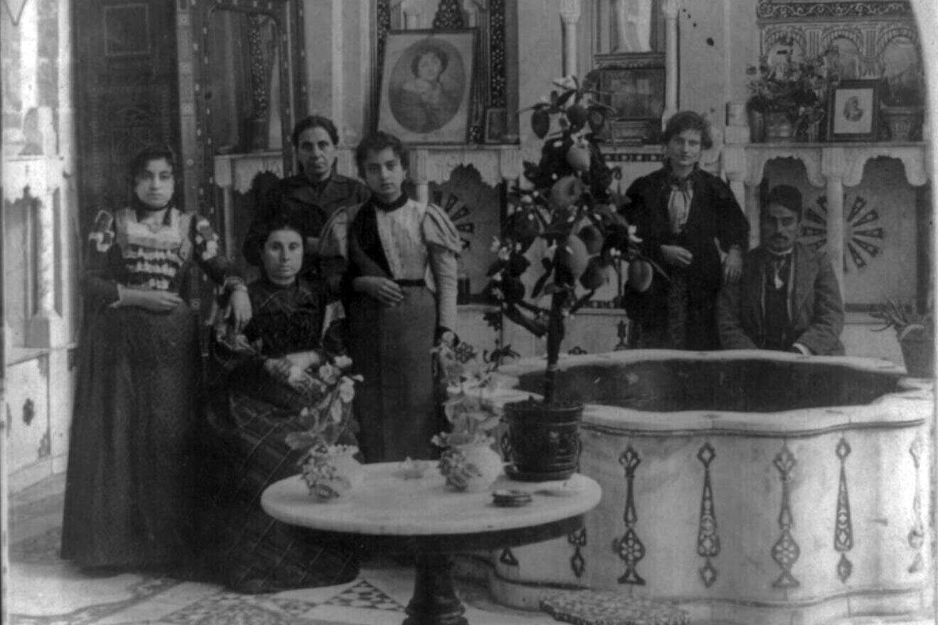 A Jewish family at home in Damascus, Syria, in 1901. Credit: R.Y. Young via Wikimedia Commons.