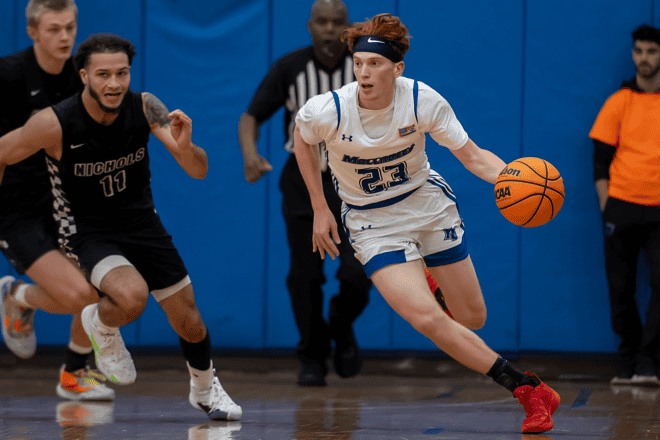 Max Zakheim (No. 23) on the Yeshiva University basketball team. Photo by Adena Stevens (used with permission).