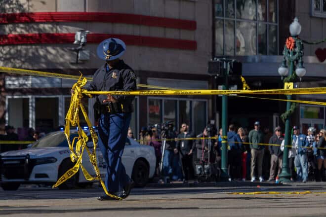 The scene near where a man drove a pickup truck into a crowd of people in the French Quarter of New Orleans on Jan. 1, 2025. Photo by Kathleen Flynn for “The Washington Post.”