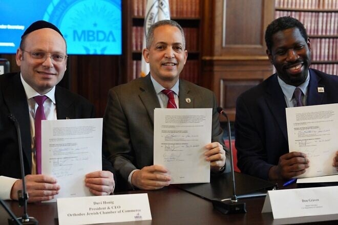 (From left) Duvi Honig, founder and CEO of the Orthodox Jewish Chamber of Commerce; Don Graves, deputy U.S. commerce secretary; and Eric Morrissette, deputy U.S. under secretary of commerce for minority business development at the signing of a memorandum of understanding in Washington, D.C., on Jan. 13, 2025. Credit: U.S. Commerce Department.