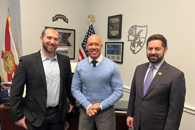(From left) Chaim Meisels, a U.S. citizen and "loan" Israeli soldier who was part of the unit that helped kill Hamas leader Yahya Sinwar, meets with Reps. Brian Mast (R-Fla.) and  Mike Lawler (R-N.Y.) in Washington, D.C., on Jan. 15, 2025. Credit: Courtesy of office of Rep. Brian Mast.