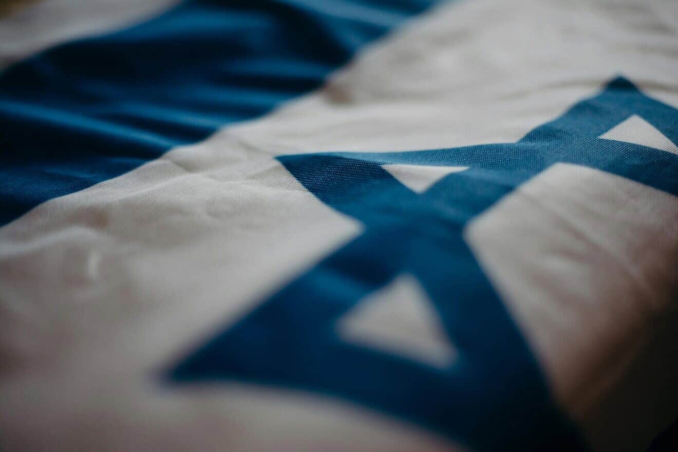 The Star of David on an Israeli flag. Credit: Cottonbro Studio/Pexels.
