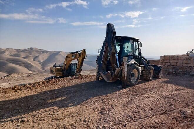 Palestinian Authority construction vehicles in the Judean Desert. Credit: Regavim.