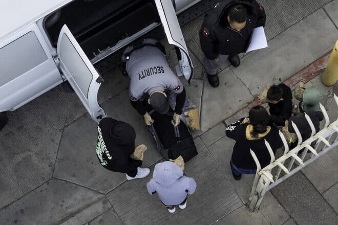 Deportees unload from a Customs and Border Protection transport vehicle after being sent back to Mexico from Nogales, Ariz., on Jan. 22, 2025. Photo by John Moore/Getty Images.