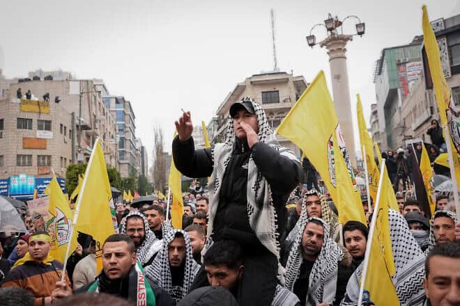Fatah supporters gather for a rally ahead of the 60th anniversary of its establishment in Ramallah, Samaria, on Dec. 31, 2024.Credit: Flash90.