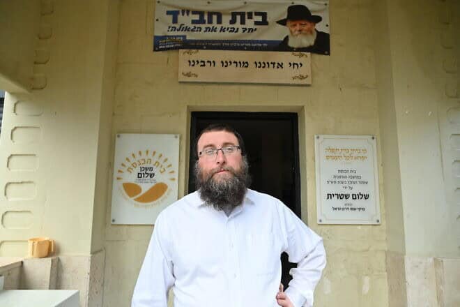 Rabbi Bentsion Gagula stands outside his synagogue in Haifa's German Colony neighborhood on Dec. 31, 2024. Photo by Canaan Lidor.