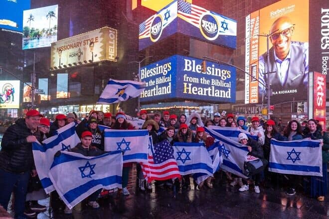 American Jewish students with the Yesha Council billboard in Times Square in New York City, on Jan. 19, 2025. Credit: Yesha Council.