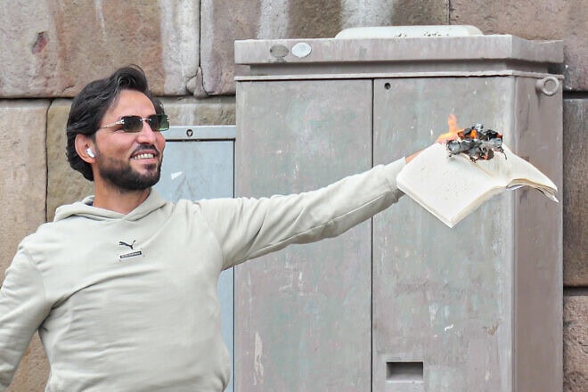 Salwan Momika burns a copy of the Quran in Stockholm, Sweden, on July 31, 2023. Credit: Frankie Fouganthin via Wikimedia Commons.