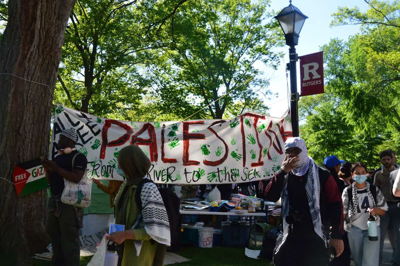 Pro-Palestinian activists gather at an encampment at Rutgers University in May 2024. Photo by Faygie Holt.