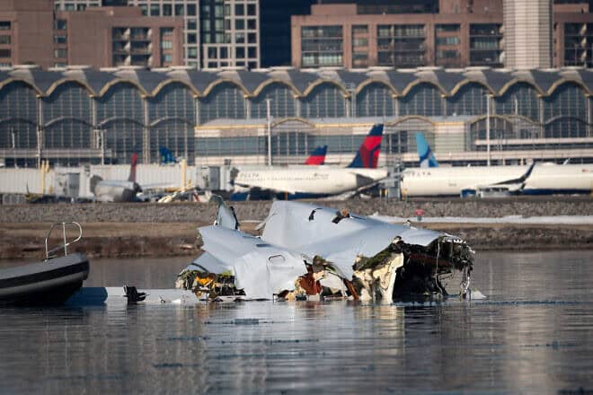 Th U.S. Coast Guard investigates aircraft wreckage on the Potomac River, near Ronald Reagan Washington National Airport outside Washington, D.C., on Jan. 30, 2025. Photo by Petty Officer 1st Class Brandon Giles/U.S. Coast Guard via Getty Images.