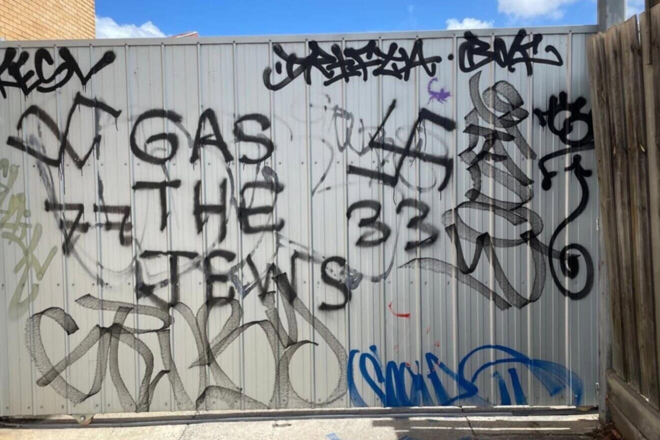Graffiti on the wall of a recently closed-down Jewish-run business in Melbourne. Credit: Courtesy of the Zionist Federation of Australia.