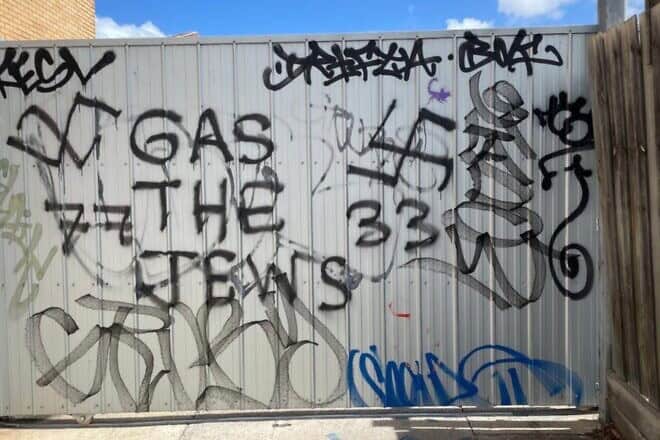 Graffiti on the wall of a recently closed-down Jewish-run business in Melbourne. Credit: Courtesy of the Zionist Federation of Australia.