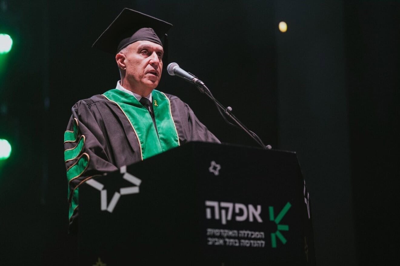 Professor Ami Moyal, president of Afeka College of Engineering, addresses graduates of the college’s 2024-25 class at commencement ceremonies at Menora Mivtachim Hall in Tel Aviv, Feb. 10, 2025. Photo by Meni Shitrit.