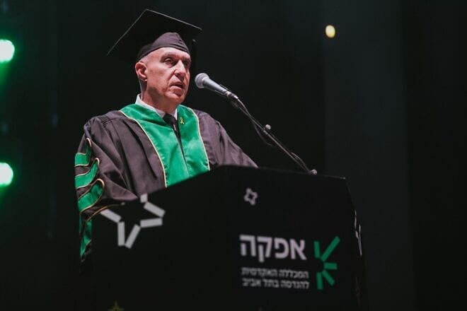 Professor Ami Moyal, president of Afeka College of Engineering, addresses graduates of the college’s 2024-25 class at commencement ceremonies at Menora Mivtachim Hall in Tel Aviv, Feb. 10, 2025. Photo by Meni Shitrit.