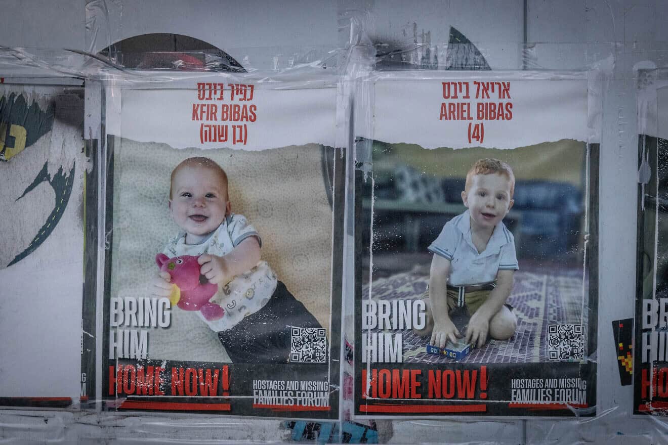 Posters of the Bibas boys, Kfir and Ariel, hang on a wall outside the Knesset in Jerusalem, Feb. 19, 2024. Photo by Chaim Goldberg/Flash90.