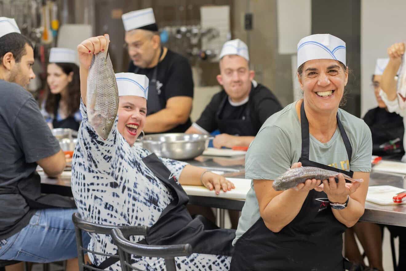 A dozen people with disabilities participated in a course to gain professional certification as assistant chefs in order to gain employment in restaurants and hotels in Jerusalem. Credit: Courtesy of Israel Elwyn.