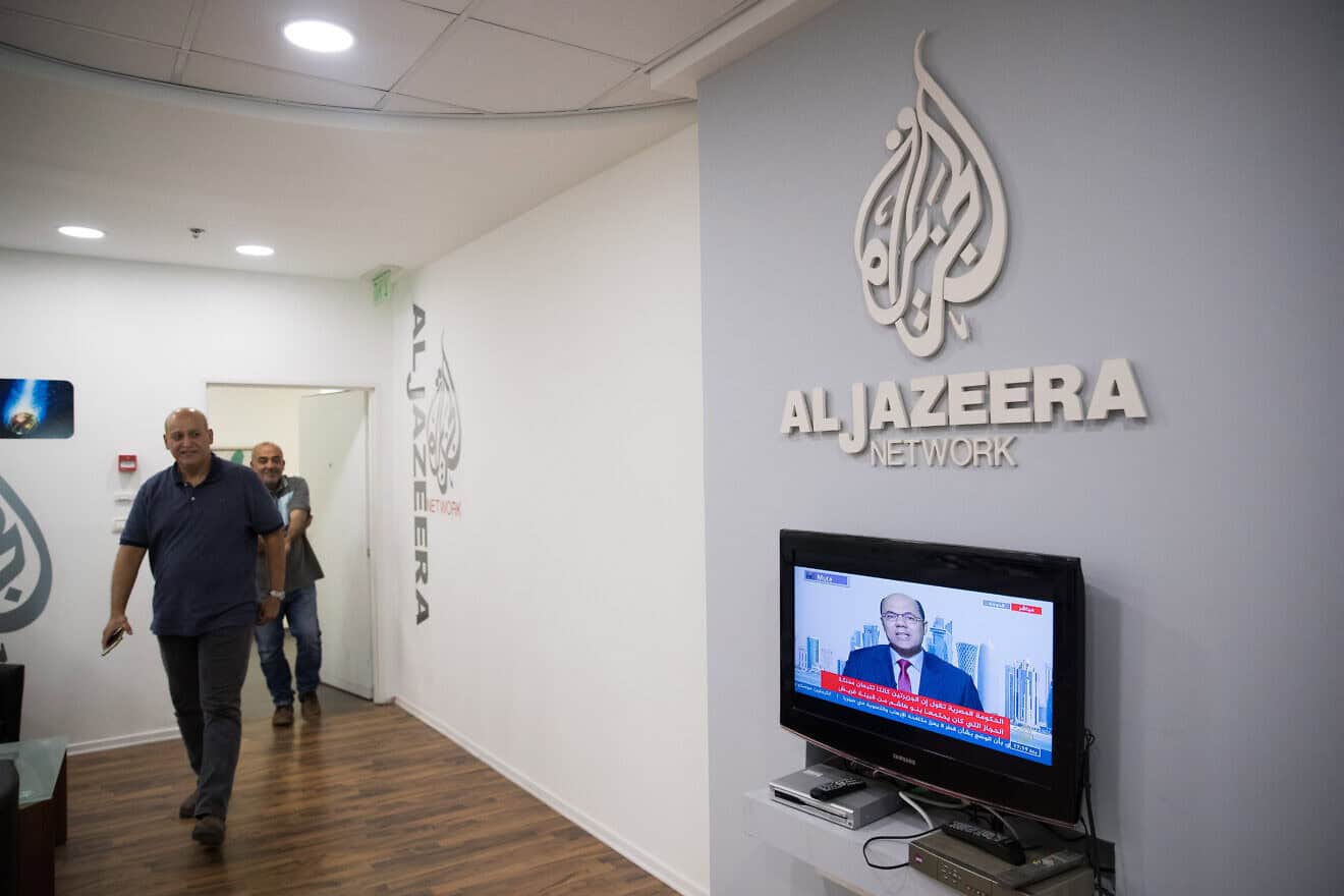 Workers at the now shuttered “Al Jazeera” offices in Jerusalem, on June 13, 2017. Photo by Yonatan Sindel/Flash90.