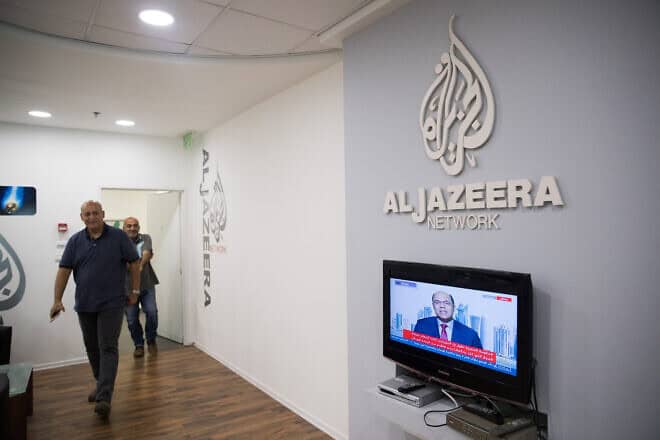 Workers at the now shuttered “Al Jazeera” offices in Jerusalem, on June 13, 2017. Photo by Yonatan Sindel/Flash90.