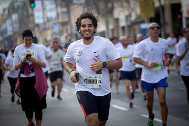 Runners take part in a marathon in Israel's coastal city of Tel Aviv on Feb. 28, 2020. Photo by Miriam Alsterýþ/Flash90.