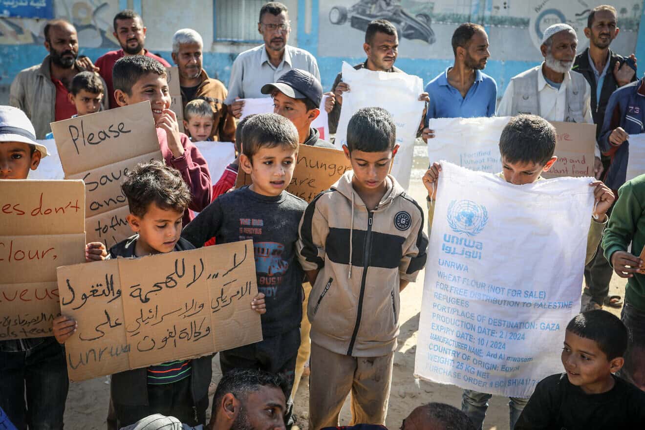 Displaced Palestinians protest in front of a headquarters affiliated with the United Nations and the U.N. Relief and Works Agency for Palestine Refugees (UNRWA), demanding the provision of flour and hunger relief in the Gaza Strip, on Nov. 17, 2024. Photo by Abed Rahim Khatib/Flash90.