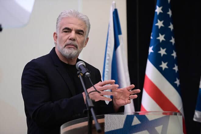 Israeli opposition leader Yair Lapid speaks at a conference entitled "Opportunities for Israel under Trump" in Tel Aviv. Jan. 28, 2025. Photo by Tomer Neuberg/Flash90