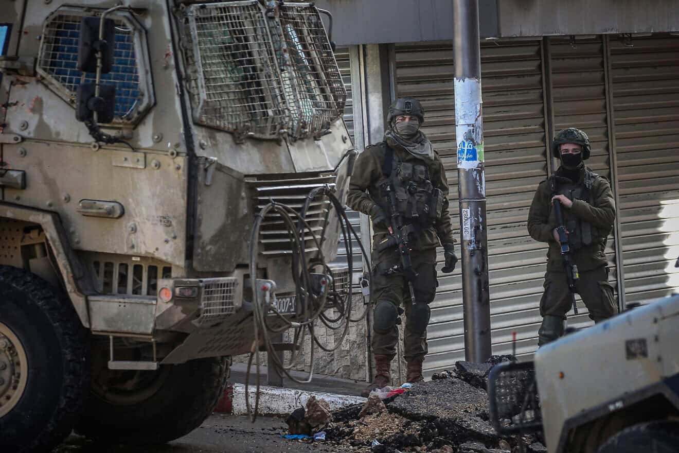 Israeli soldiers seen in the street during a military raid in Tulkarem, in northern Samaria, Feb. 5, 2025. Photo by Nasser Ishtayeh/Flash90.