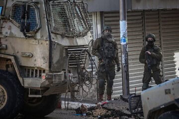 Israeli soldiers seen in the street during a military raid in Tulkarem, in northern Samaria, Feb. 5, 2025. Photo by Nasser Ishtayeh/Flash90.