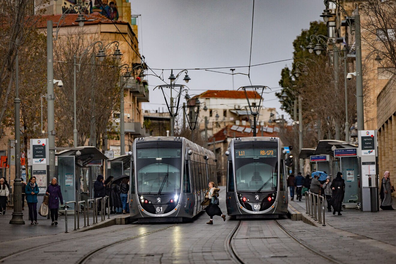 People walking next to the light rail on Jaffa Street in central Jerusalem, Feb. 21, 2025. Credit: Yonatan Sindel/Flash90.