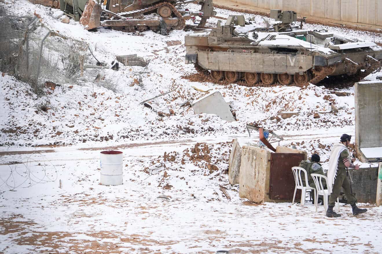 Israeli soldiers seen in the snow on the Israeli border with Lebanon, on Feb. 24, 2025. Photo by Ayal Margolin/Flash90.