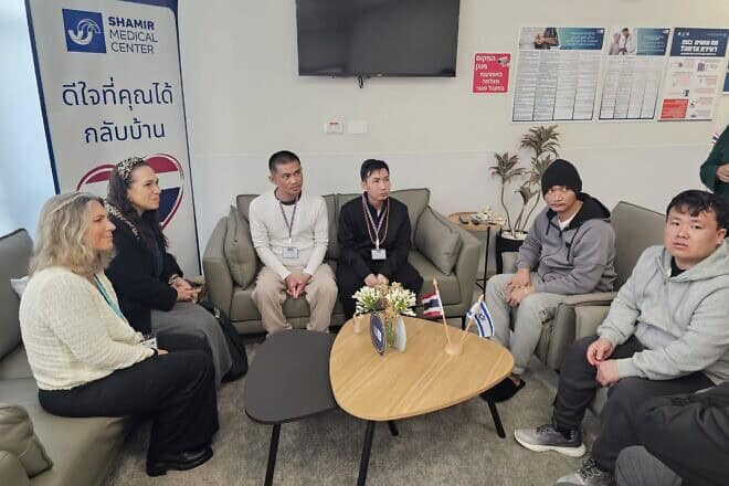 Yael Eckstein, president of the International Fellowship of Christians and Jews (second from left), visits with released hostages from Thailand at Shamir Medical Center (formerly Asaf Harofeh Hospital) outside of Tel Aviv, February 2025. Credit: Courtesy of IFCJ.