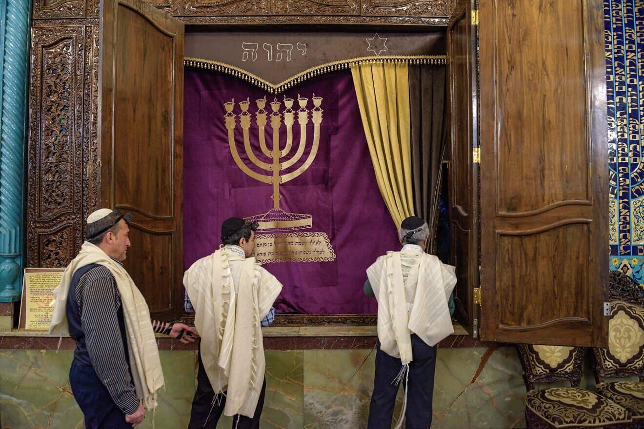Jewish men pray in a synagogue in Tehran, Feb. 13, 2020. Photo by Hossein Beris/Middle East Images/AFP via Getty Images.