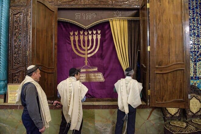 Jewish men pray in a synagogue in Tehran, Feb. 13, 2020. Photo by Hossein Beris/Middle East Images/AFP via Getty Images.