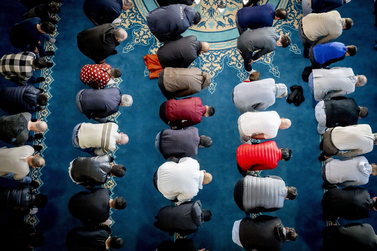 Muslim worshippers perform the morning prayers at the Ulu Mosque in Utrecht, the Netherlands, on the first day of Eid al-Adha, June 16, 2024. Photo by Robin Utrecht/ANP/AFP via Getty Images.