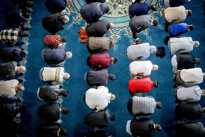 Muslim worshippers perform the morning prayers at the Ulu Mosque in Utrecht, the Netherlands, on the first day of Eid al-Adha, June 16, 2024. Photo by Robin Utrecht/ANP/AFP via Getty Images.