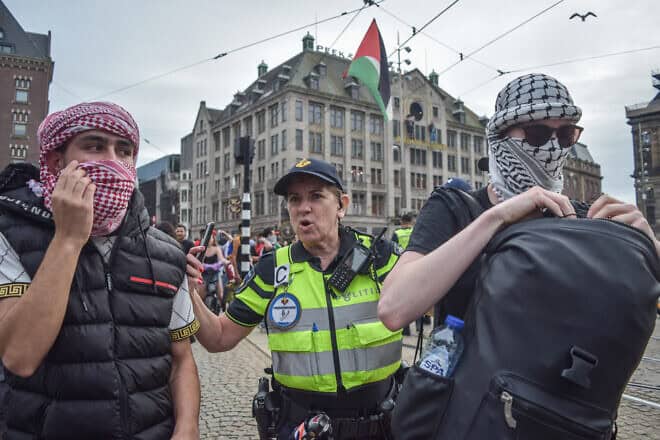 Dutch police respond to an anti-Israel protest in central Amsterdam, Aug. 10, 2024. Photo by Mouneb Taim/Middle East Images/AFP via Getty Images.