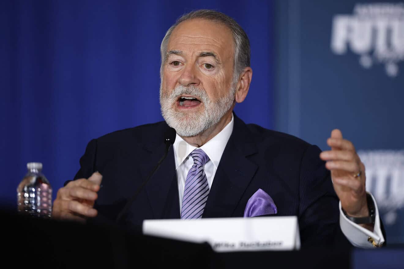 Former Arkansas Governor Mike Huckabee moderates a roundtable discussion with then-Republican presidential nominee, former U.S. President Donald Trump at the Drexelbrook Catering & Event Center on Oct. 29, 2024 in Drexel Hill, Pennsylvania. Photo by Chip Somodevilla/Getty Images.