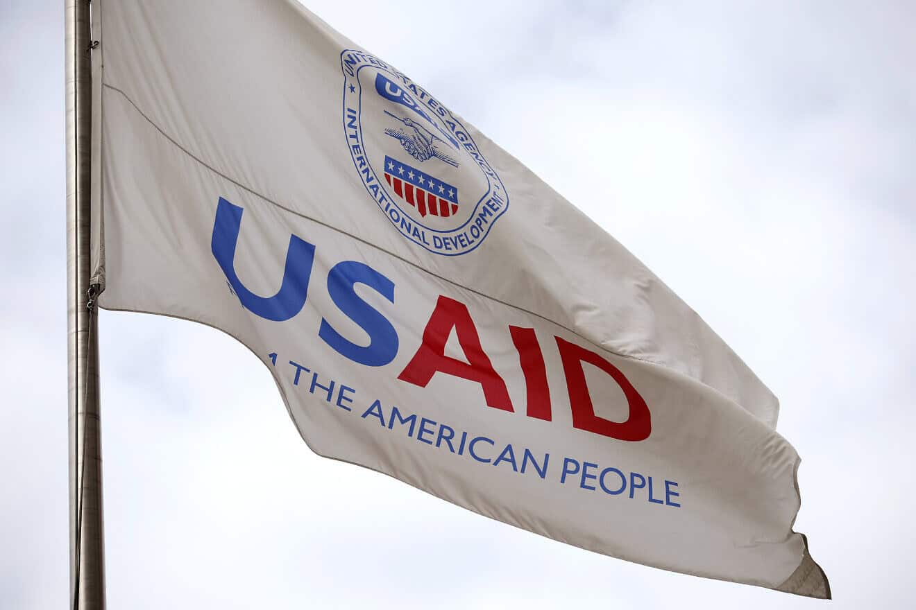A flag outside U.S. Agency for International Development (USAID) headquarters in Washington, D.C., on Feb. 3, 2025. Photo by Kevin Dietsch/Getty Images.