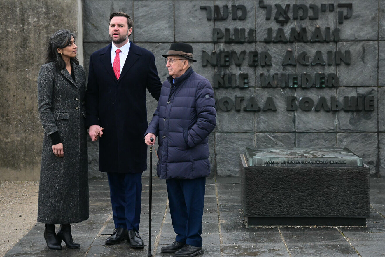 U.S. Vice President JD Vance and his wife Usha Vance with Holocaust survivor Abba Naor at the Dachau Concentration Camp memorial site in Dachau, southern Germany, on Feb. 13, 2025. Photo by Tobias Schwarz/AFP via Getty Images.