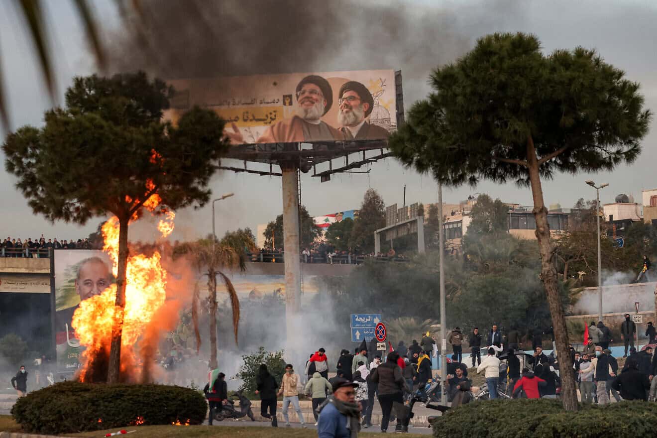 Clashes between Hezbollah supporters and the Lebanese Army amid a Hezbollah-organized rally to block the road to Beirut International Airport over a decision to bar two Iranian flights from landing there, in Beirut on Feb. 15, 2025. Photo by Ibrahim Amro/AFP via Getty Images.