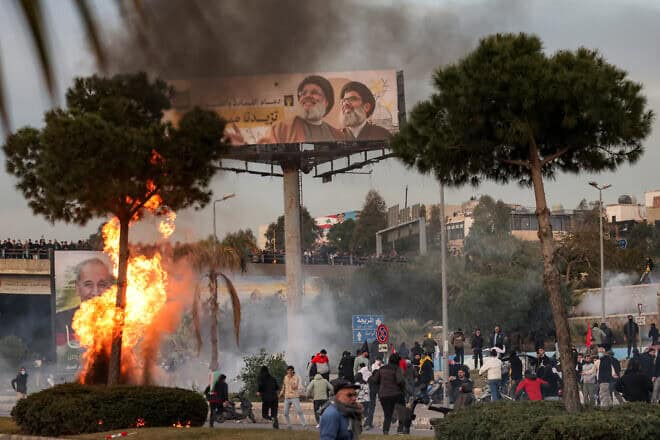 Clashes between Hezbollah supporters and the Lebanese Army amid a Hezbollah-organized rally to block the road to Beirut International Airport over a decision to bar two Iranian flights from landing there, in Beirut on Feb. 15, 2025. Photo by Ibrahim Amro/AFP via Getty Images.