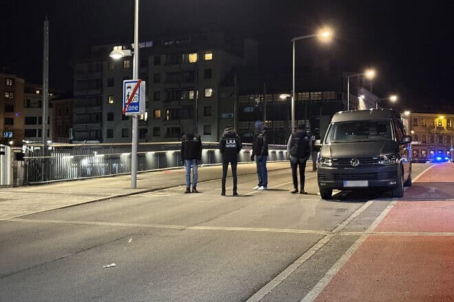 Officers of the Austrian State Criminal Police are seen near a cordoned off area after a knife attack near the main square in the city centre of Villach, southern Austria on Feb. 15, 2025. Photo by Gerd Eggenberger/APA/AFP via Getty Images.