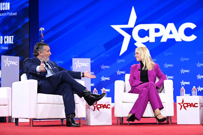 Sen. Ted Cruz (R-Texas) speaks with U.S. Attorney General Pam Bondi during the annual Conservative Political Action Conference (CPAC) at the Gaylord National Resort & Convention Center at National Harbor in Oxon Hill, Md., Feb. 20, 2025. (Photo by Saul Loeb/AFP via Getty Images.