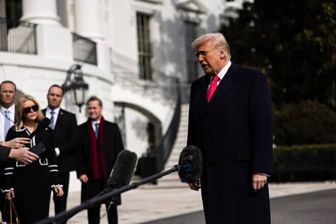 U.S. President Donald Trump speaks to reporters prior to departing the White House on Feb. 22, 2025 in Washington, DC. Photo by Tierney L. Cross/Getty Images.