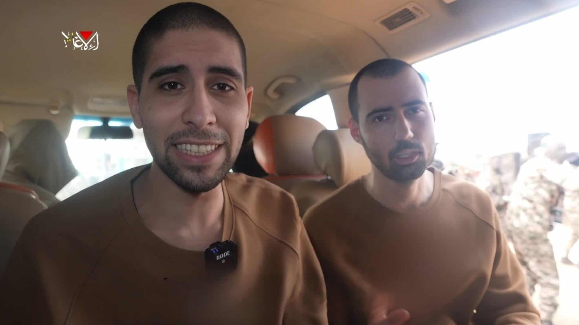 Hostages Guy Gilboa-Dalal and Evyatar David being forced to watch the ceremony of other captives being released in a Hamas propaganda video, the Gaza Strip, Feb. 22, 2025. Source: Israel Hayom.